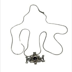 Genuine Pearl in a MOM Pearl cage with 24in chain